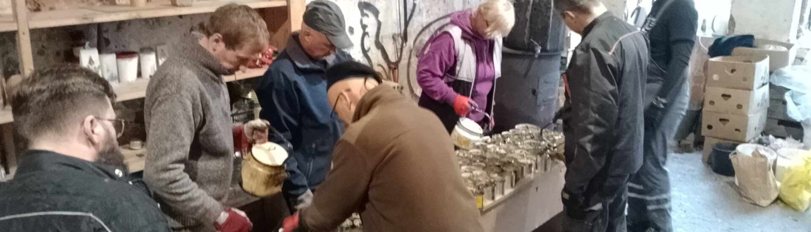 Volunteers making trench candles for Ukrainian soldiers